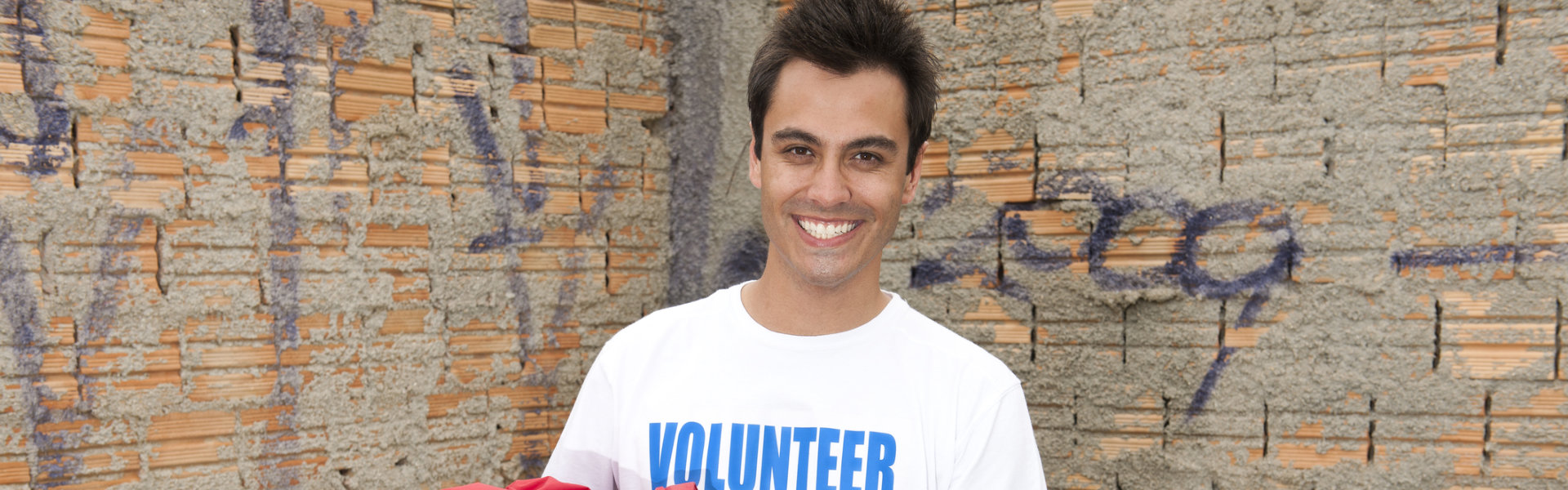 male volunteer smile on the camera